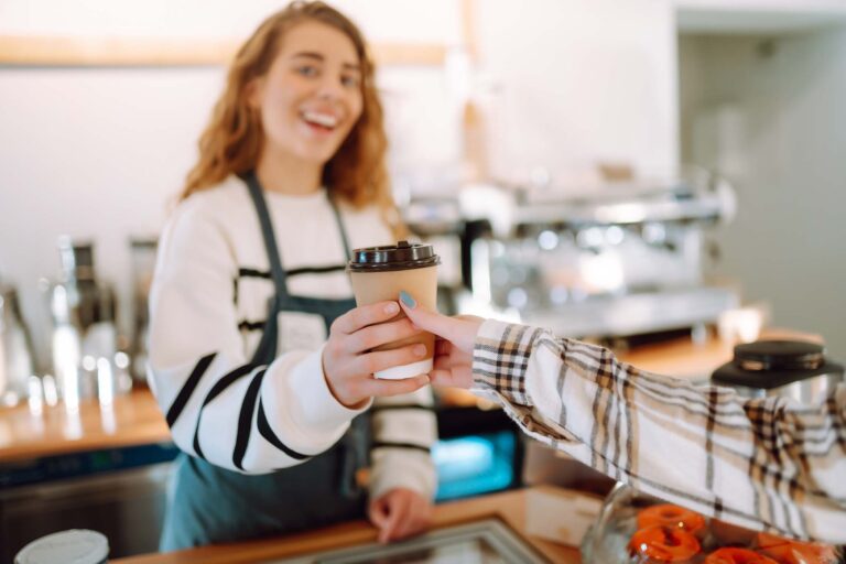 barista-woman-at-coffee-shop-holding-take-away-cof-D4PA4Q5.jpg