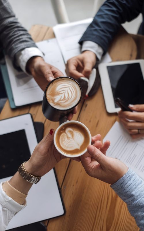 colleagues-with-coffee-cup-front-view